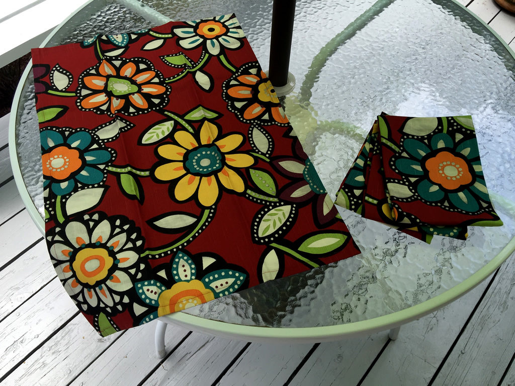 Decorative towels featuring bold colorful flowers.