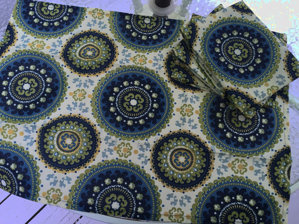 Decorative towel featuring blue and green deco circles. (TWL-009)