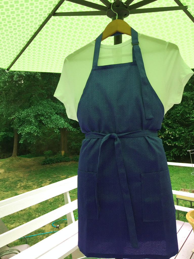 Chef’s apron featuring blue pinstripe design. (APR-008)