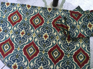 Decorative towel featuring arabesque designs in dark red, blue and green. (TWL-003)