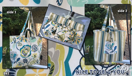 Reversible tote bag featuring teal blue tones bold flowers and striped fabrics.
